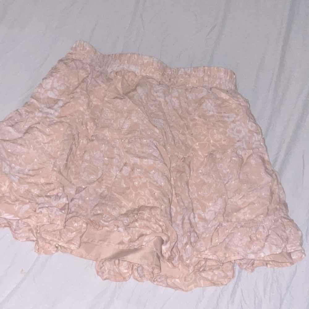 Peach Flowy mini skirt with white patterns